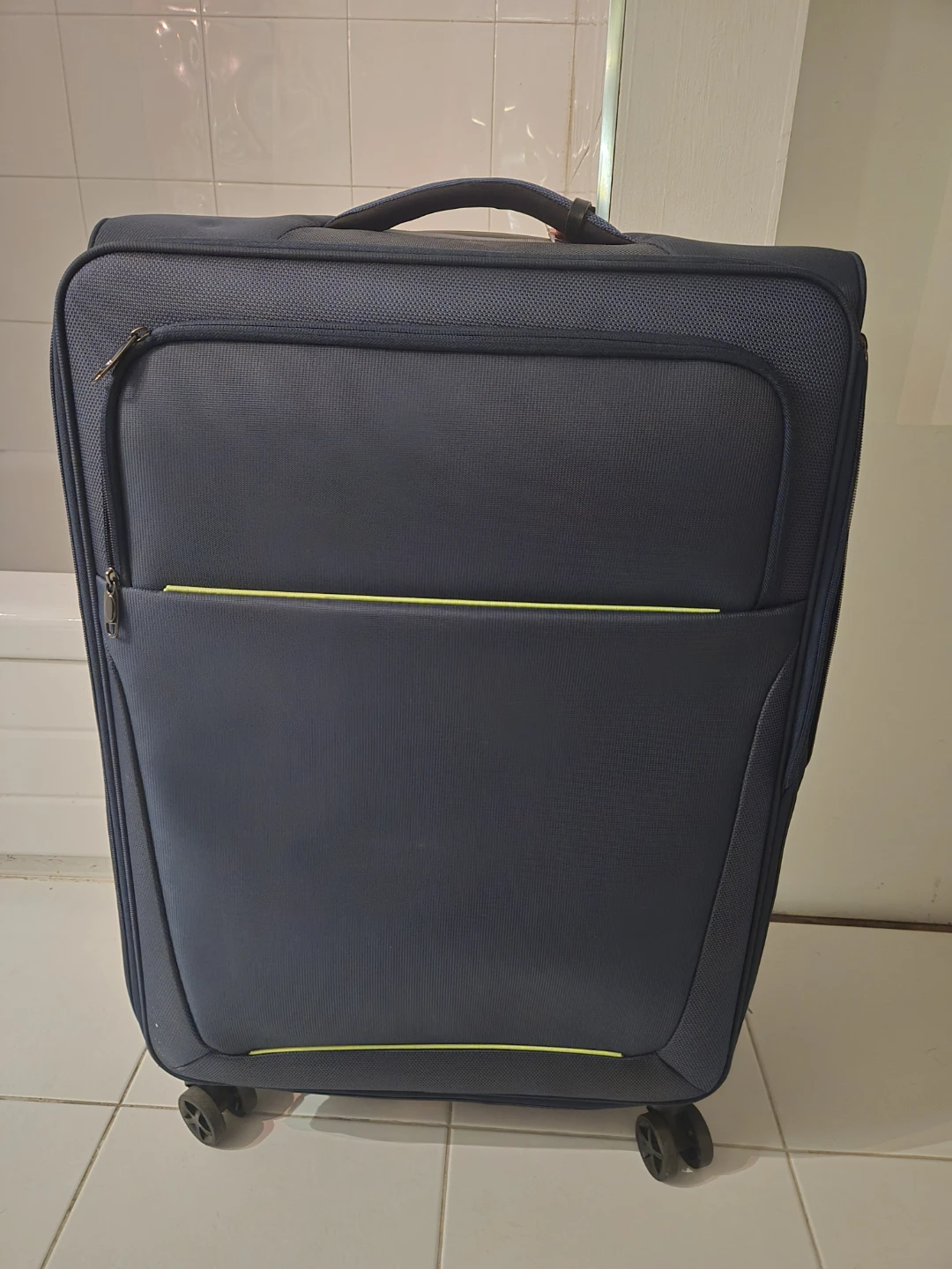 Dark blue check-in suitcase