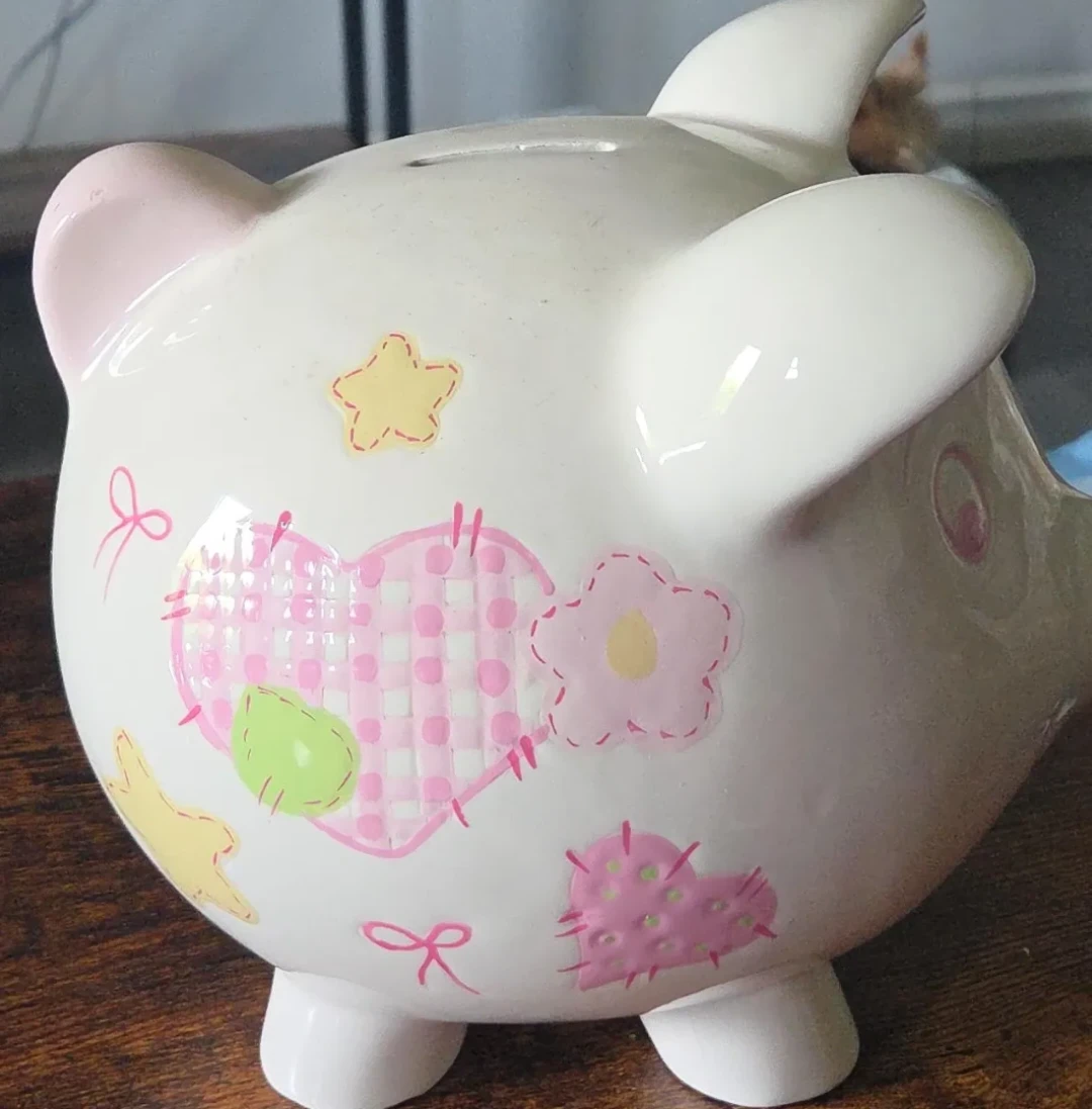 White Ceramic Piggy Bank with Pink and Yellow Accents