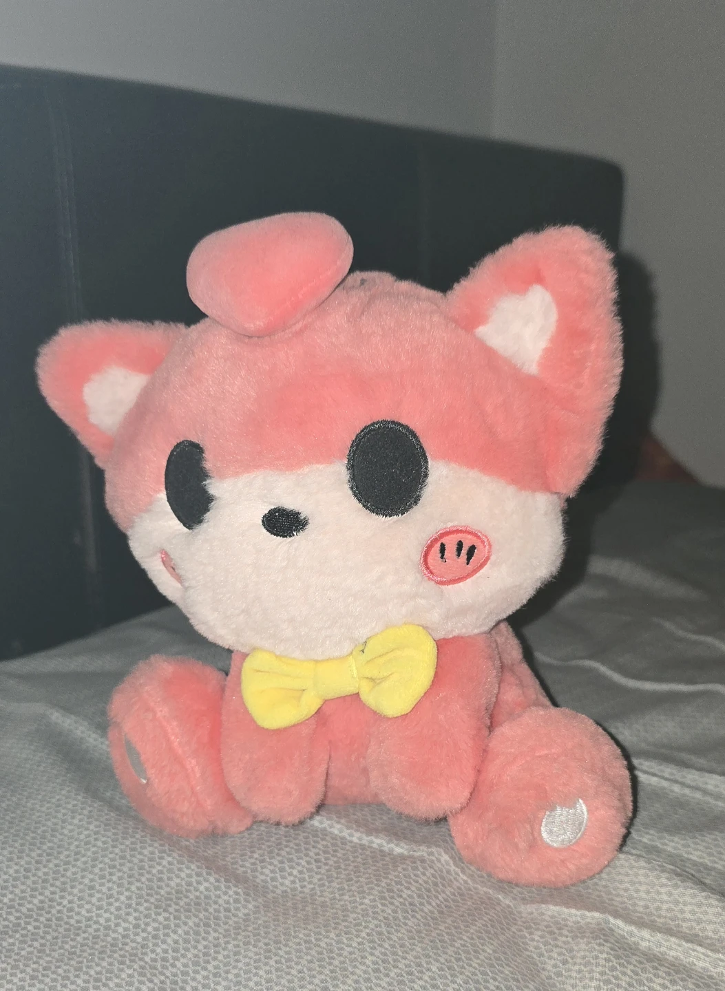 Pink Plush Toy with Yellow Bowtie