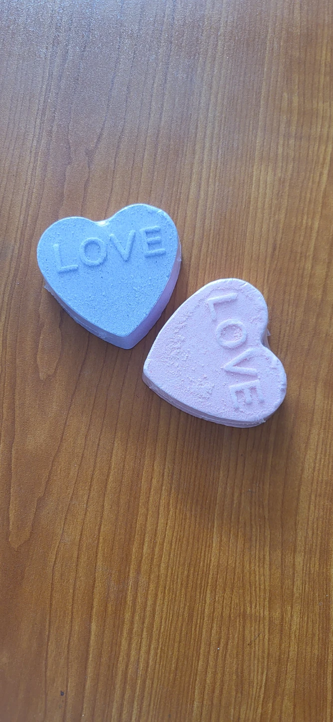2 Heart-shaped Bath Bombs with 'LOVE' inscribed