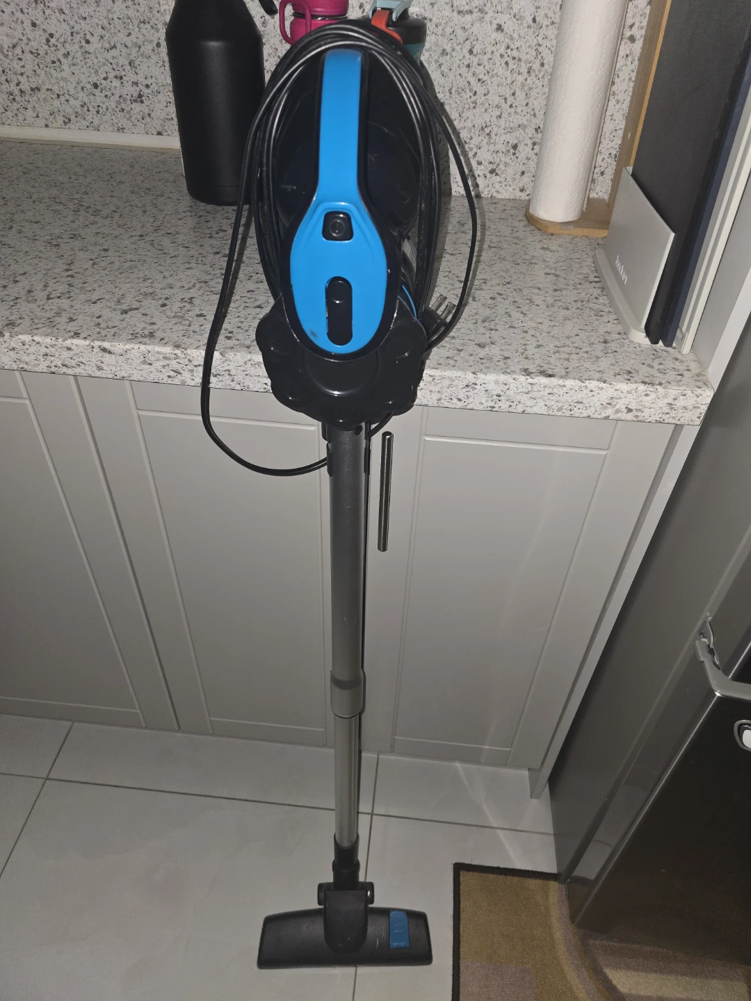 Blue and Black Stick Vacuum Cleaner