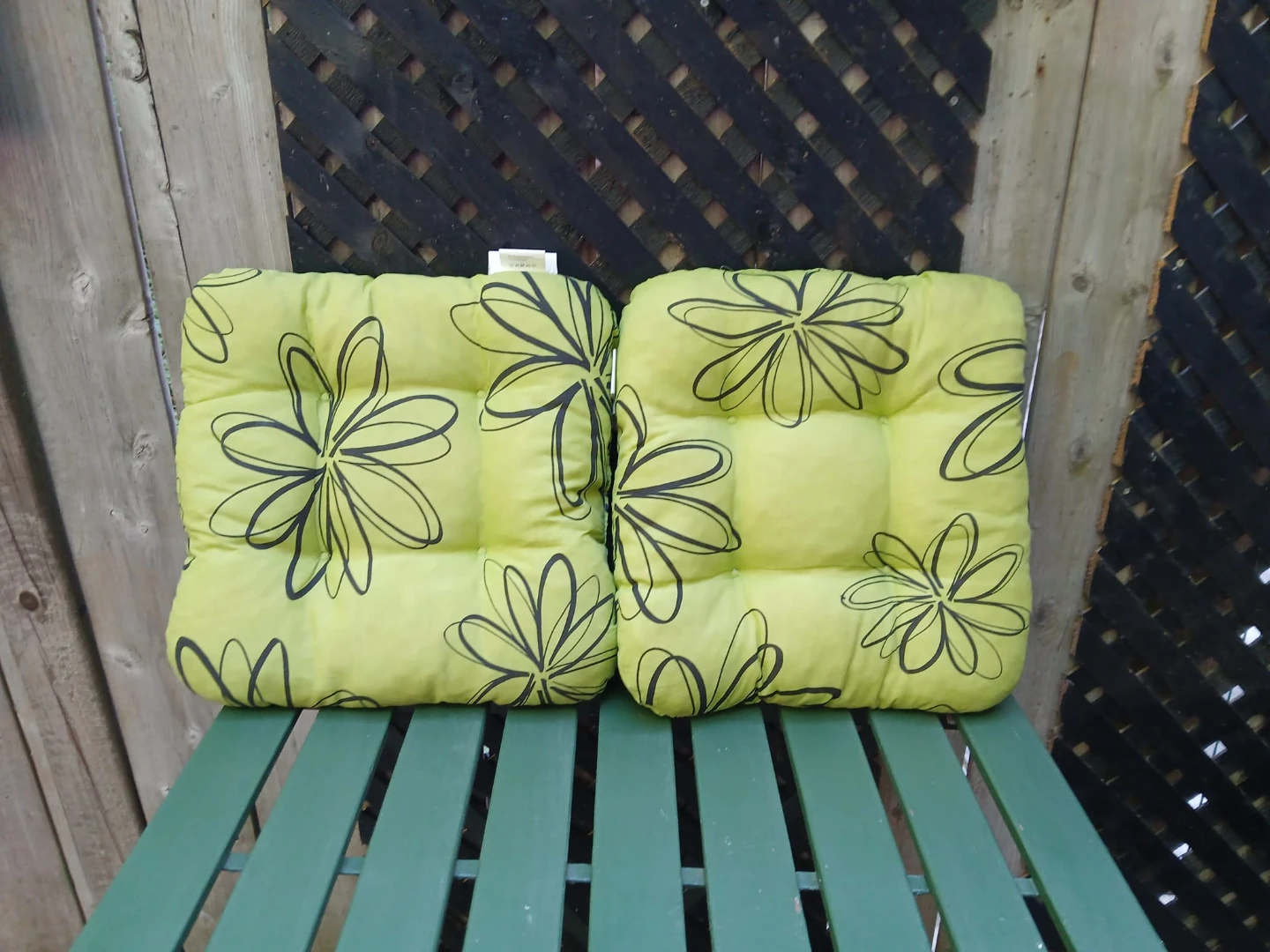 Two green patio seat cushions with floral pattern - photo 2