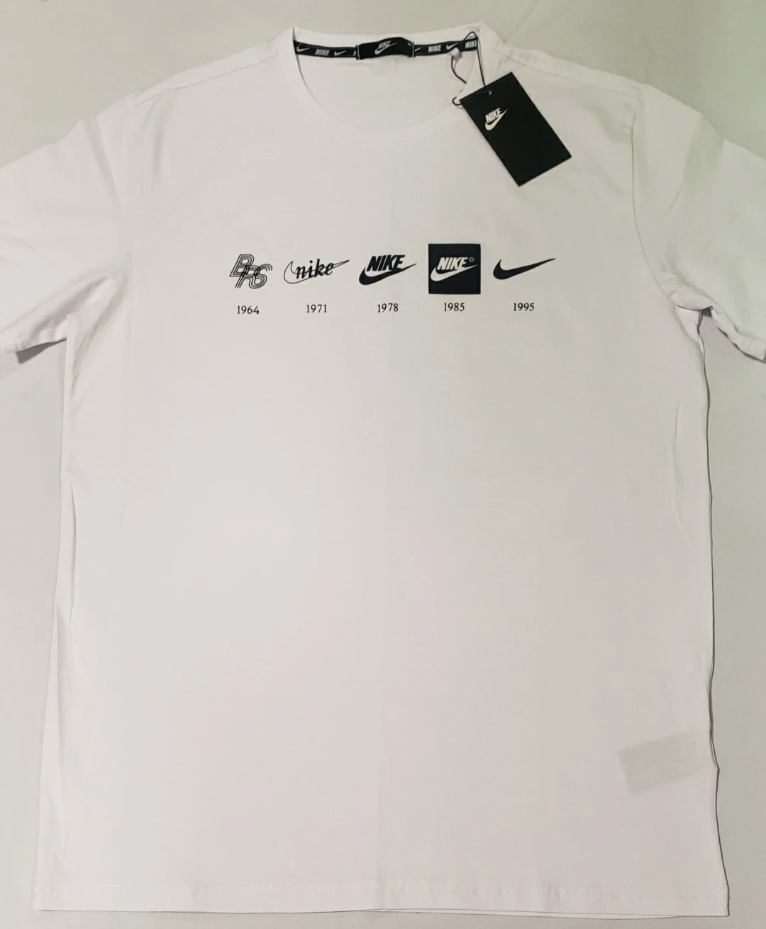 Brand new Nike White T-Shirt - Logo Evolution