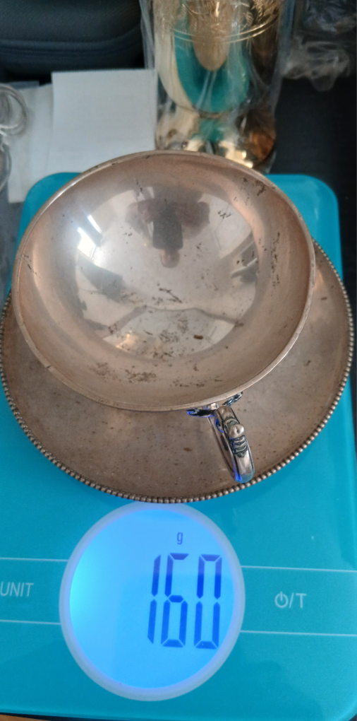 Silver Cup and Saucer Set