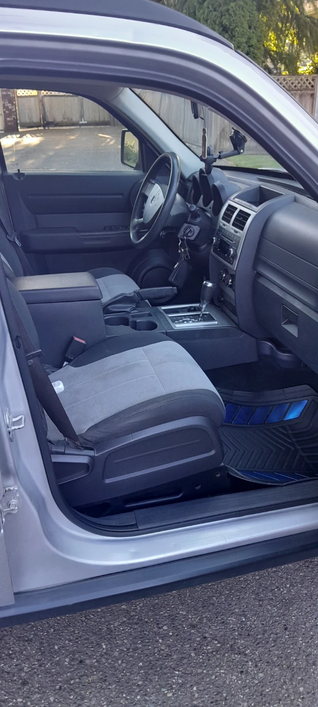 Silver Dodge Nitro SUV - photo 4