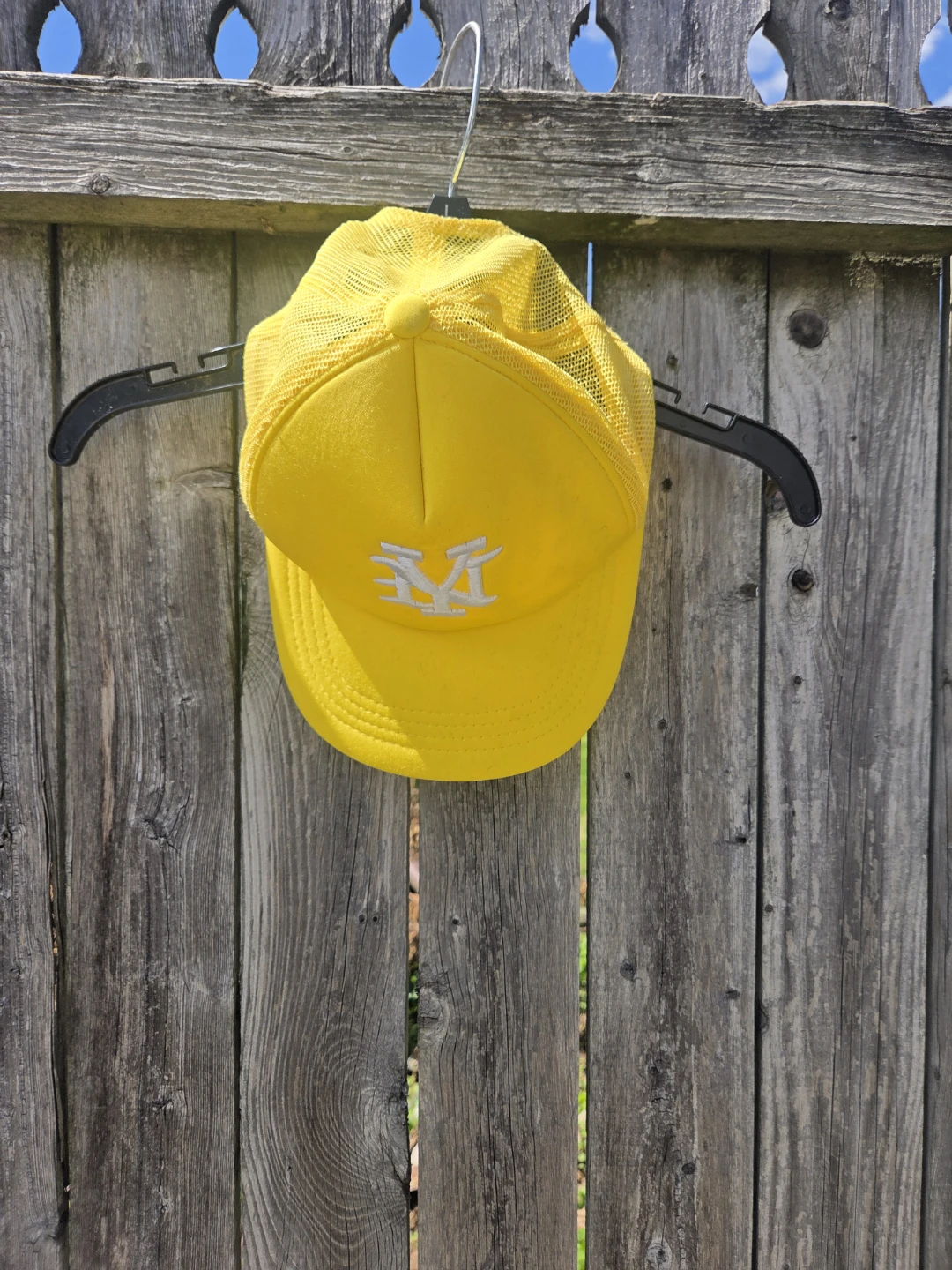 Yellow trucker hat with NY logo