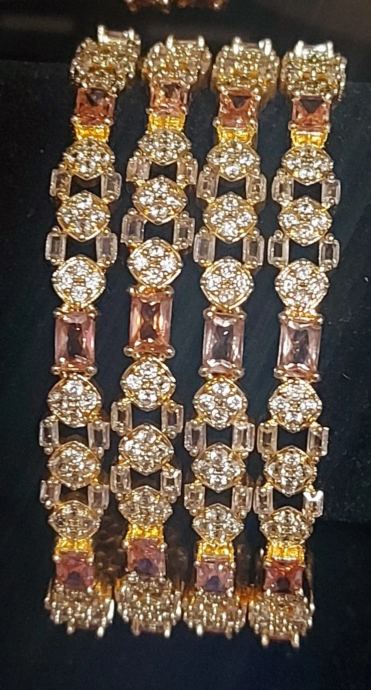 Gold-tone AD bangles with Clear and champagne colors Stones