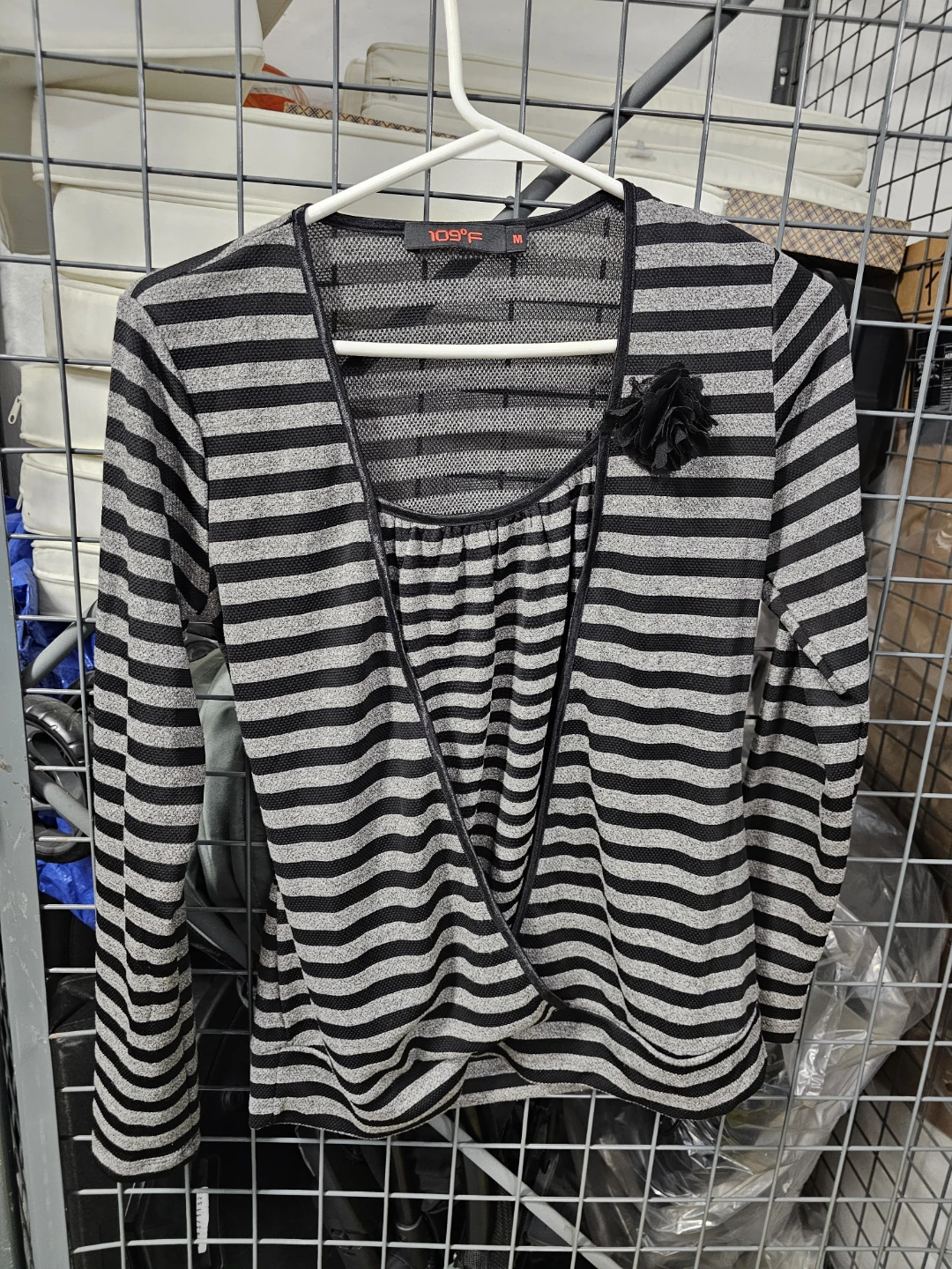 109°F Striped Long Sleeve Top with Flower Accent