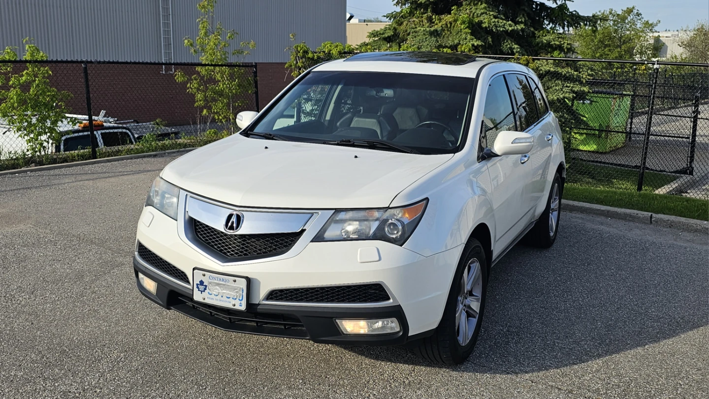White Acura MDX SUV