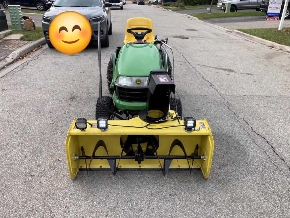 John Deere Riding Mower with Snowblower Attachment