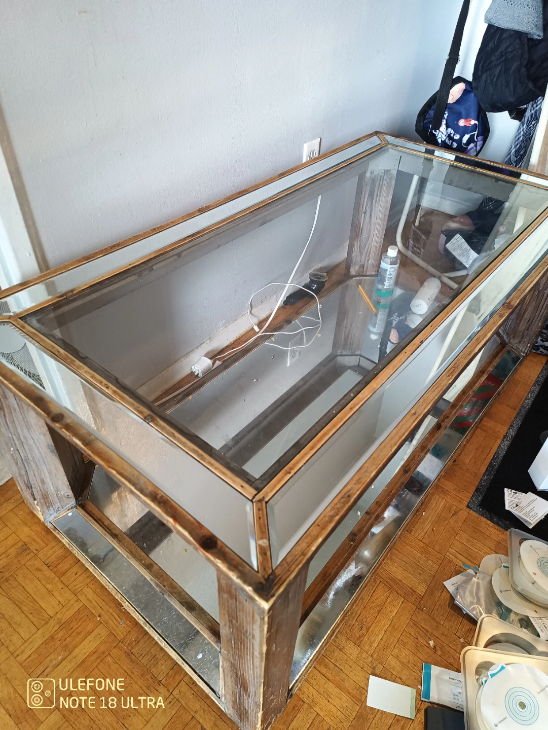 Mirrored Coffee Table with Wooden Accents