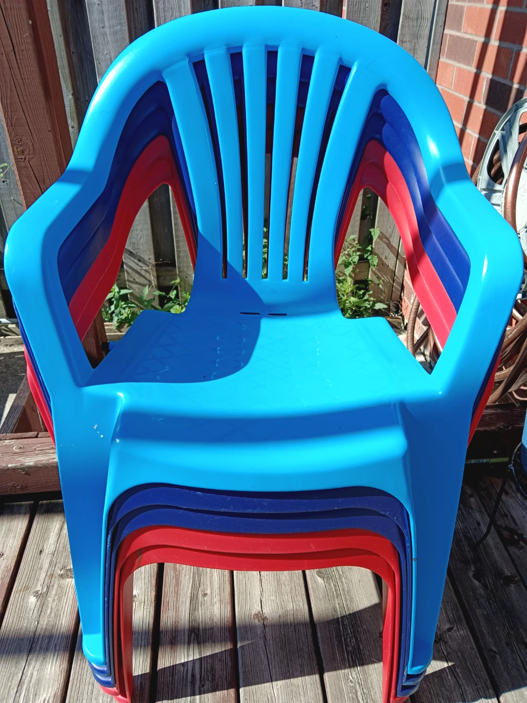 Five Stackable Plastic Chairs - Blue, Red, Dark Blue