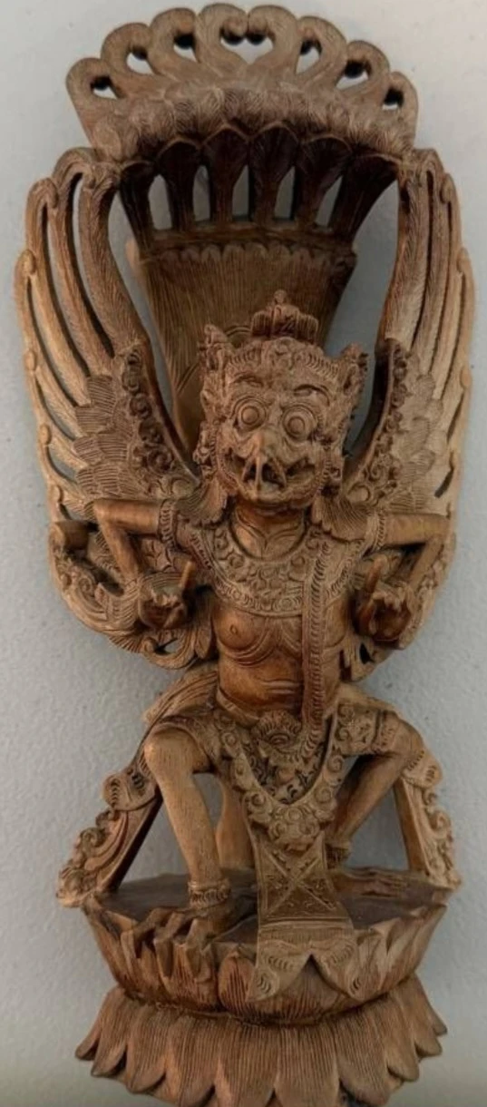 Hand-carved wooden Garuda statue Bali