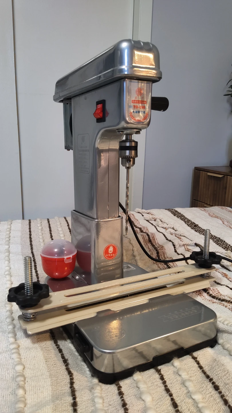 Drill press for bookbinding