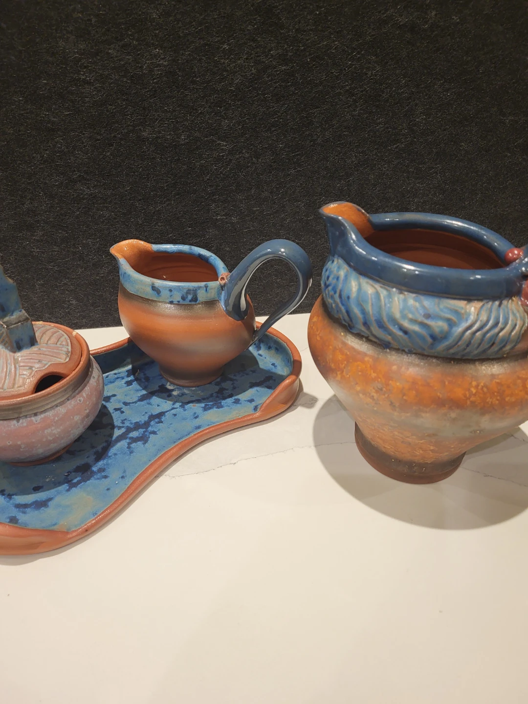 Handmade clay jug and cream and sugar set