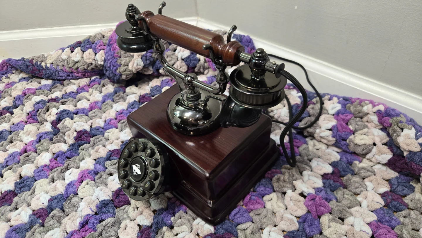 Decorative vintage candlestick telephone