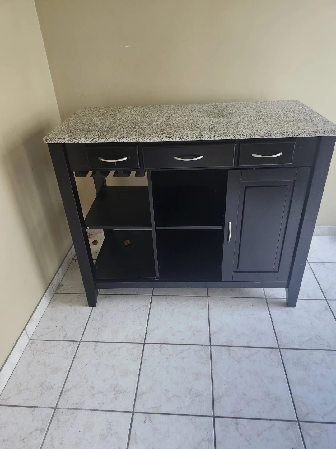 Marble-topped island dining table