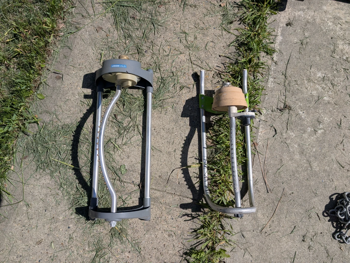 Two oscillating sprinklers