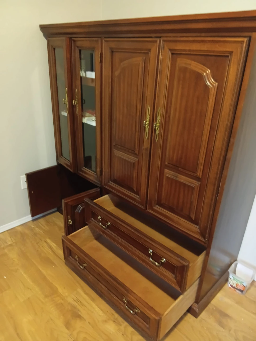 Wooden Armoire with Glass Doors and Drawers