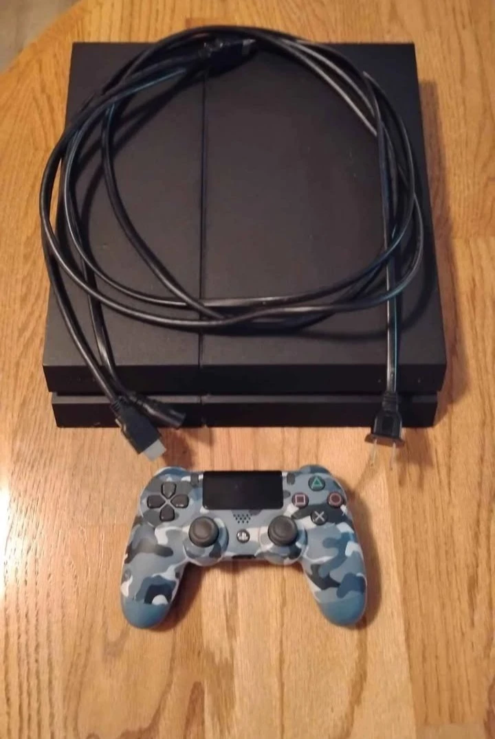 Sony PlayStation 4 Console with Controller and Cables