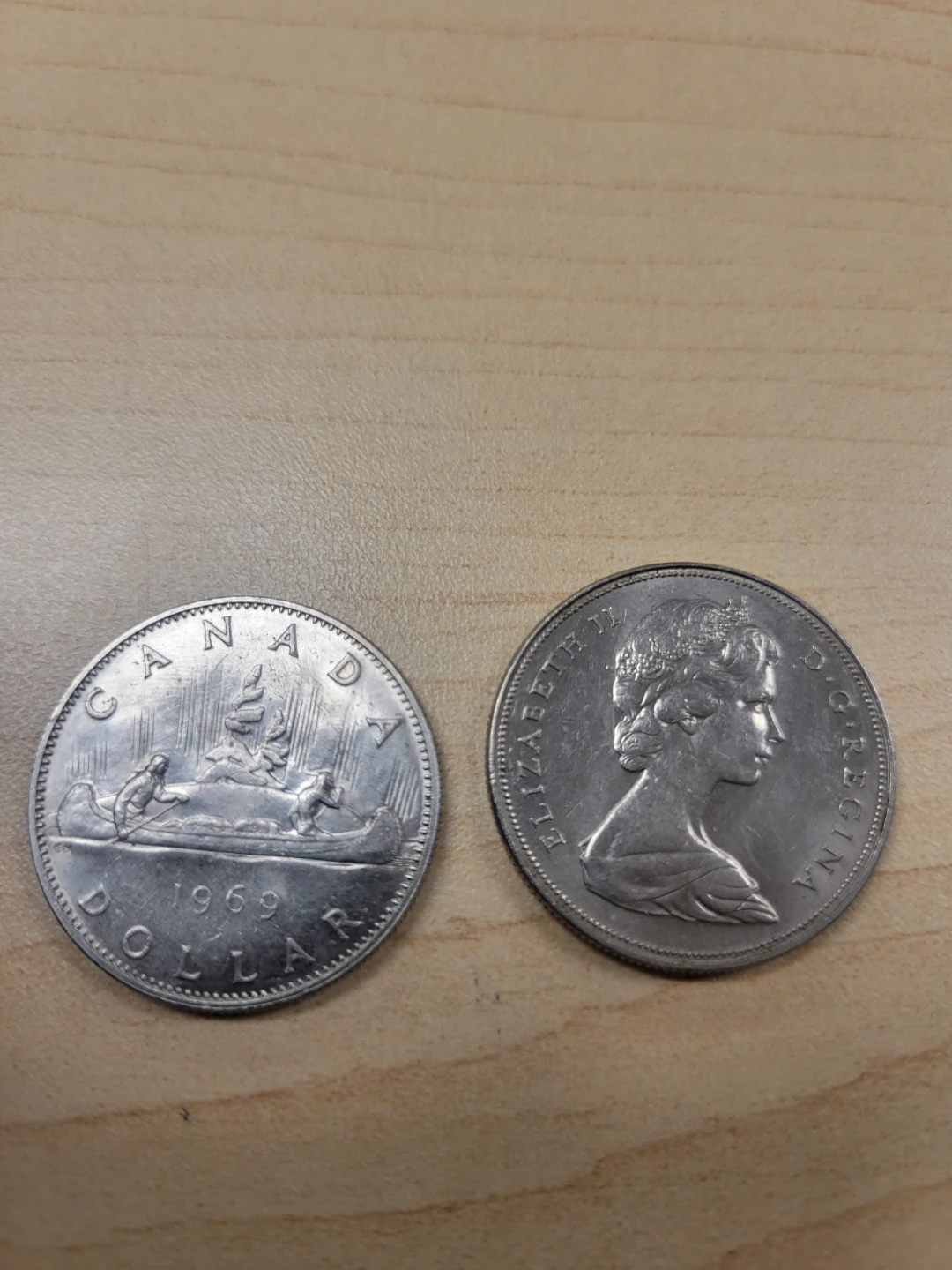 Two 1969 Canadian Dollar Coins - photo 3