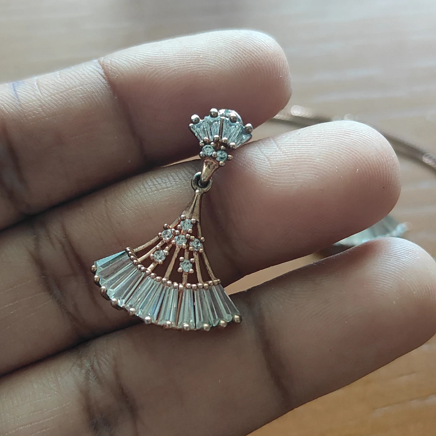 Gold toned earrings and pendant - photo 2