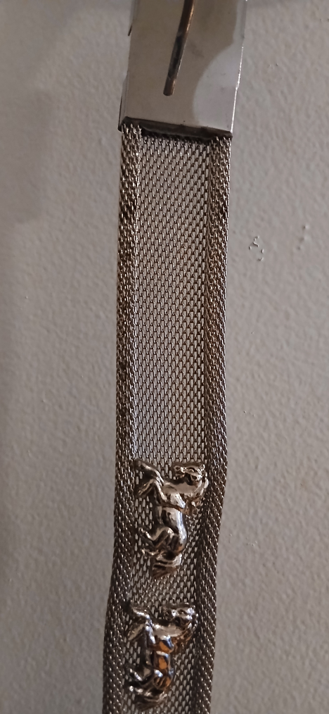 B.B. Simon belt featuring a crystal-studded strap