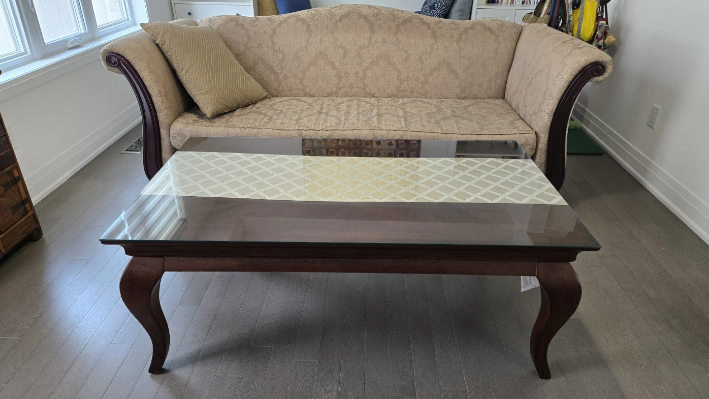 Sofa with patterned upholstery and dark wood trim - photo 2