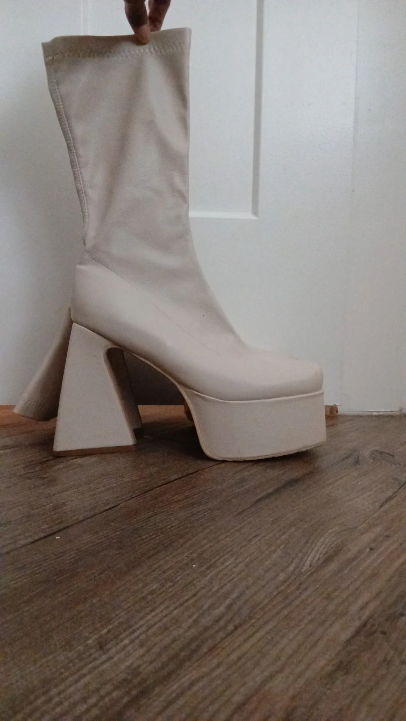 Cream platform boots with triangular heel