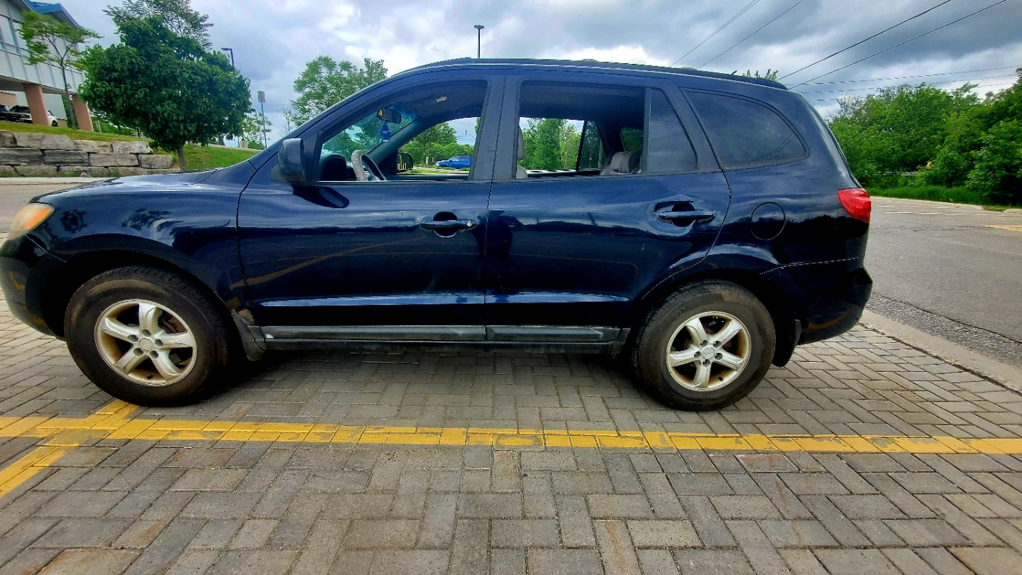 Dark Blue Hyundai Santa Fe SUV - photo 2
