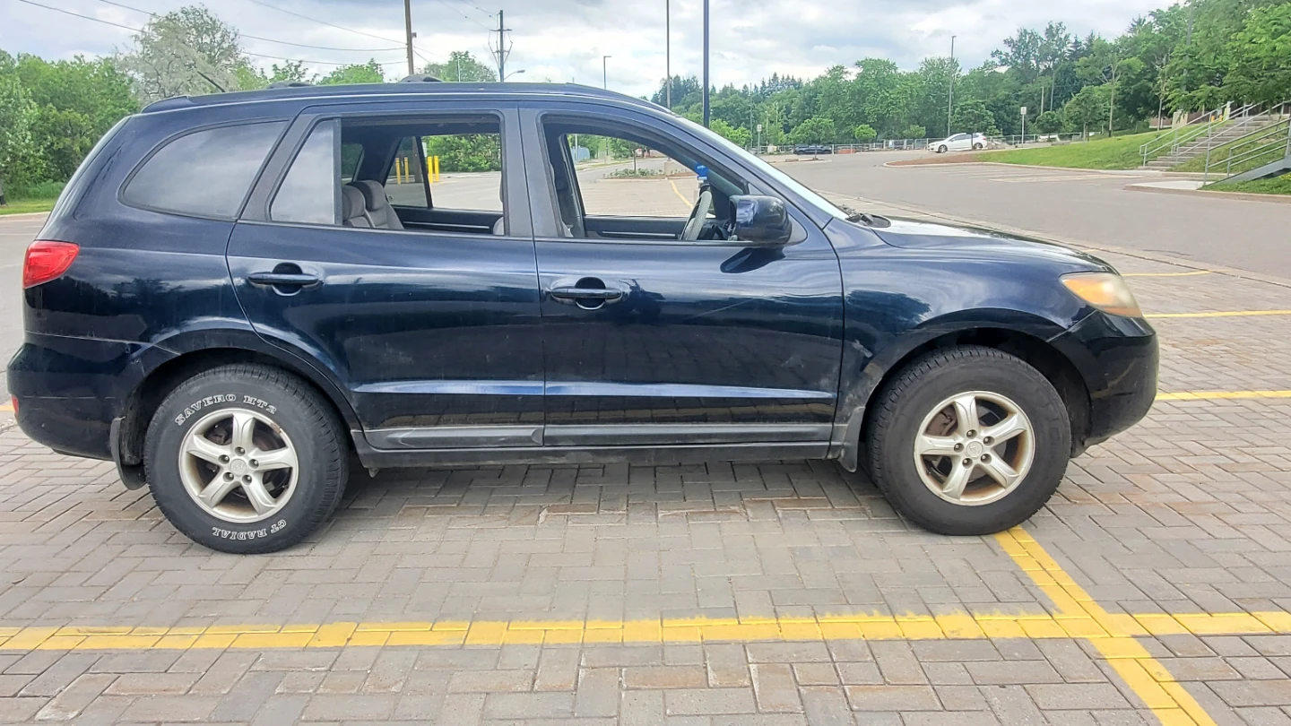 Dark Blue Hyundai Santa Fe SUV - photo 3