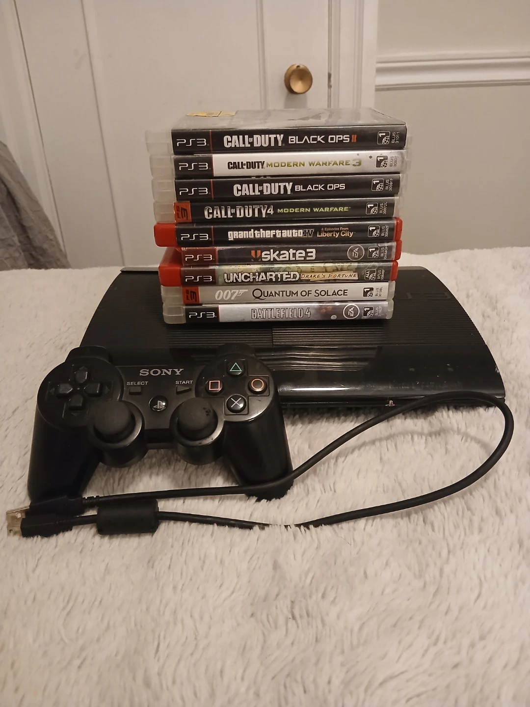 Sony Playstation 3 Super Slim 500GB w/ Controller & Games
