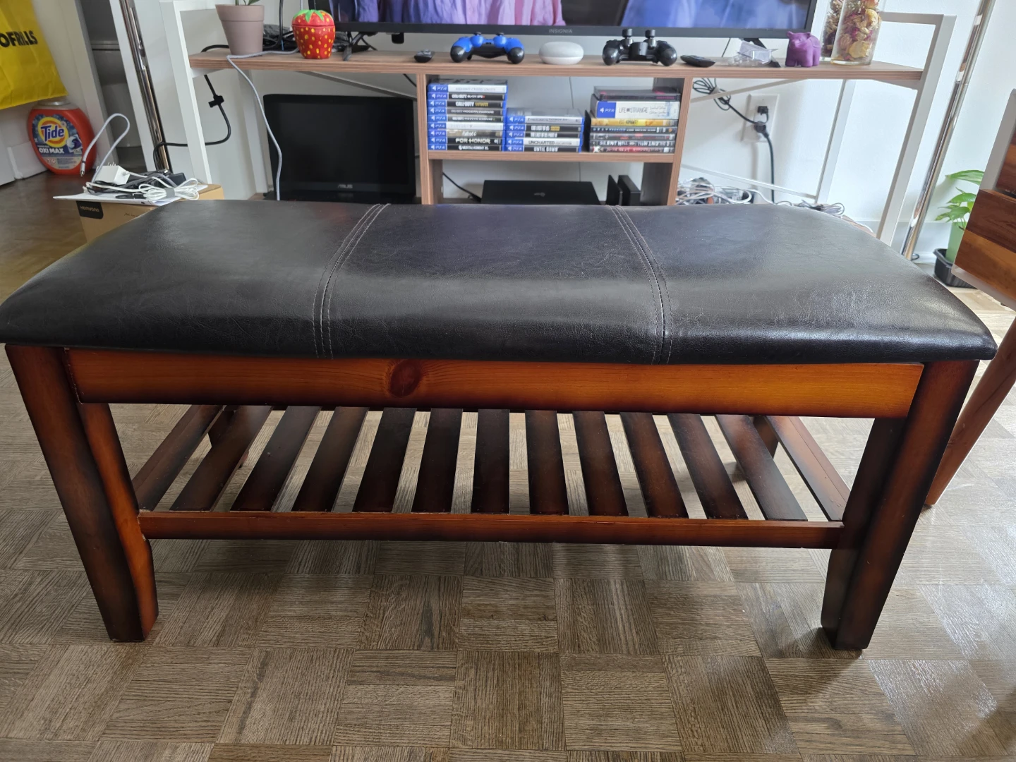 Black and dark wooden bench