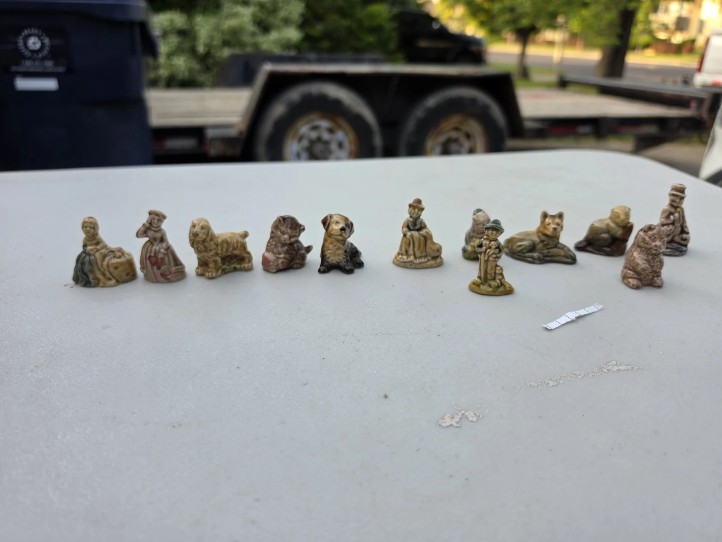 Collection of 11 Small Ceramic Figurines