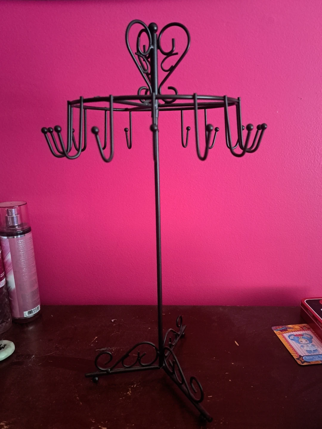 Black Metal Rotating Jewelry Stand with Heart Detail
