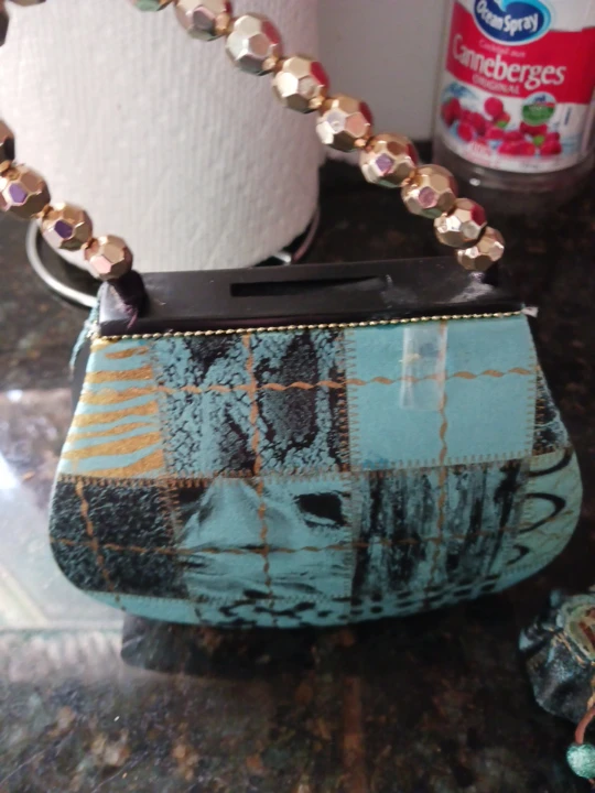 This is a coin bank Decorative Clutch Purse with Beaded Handle - photo 5