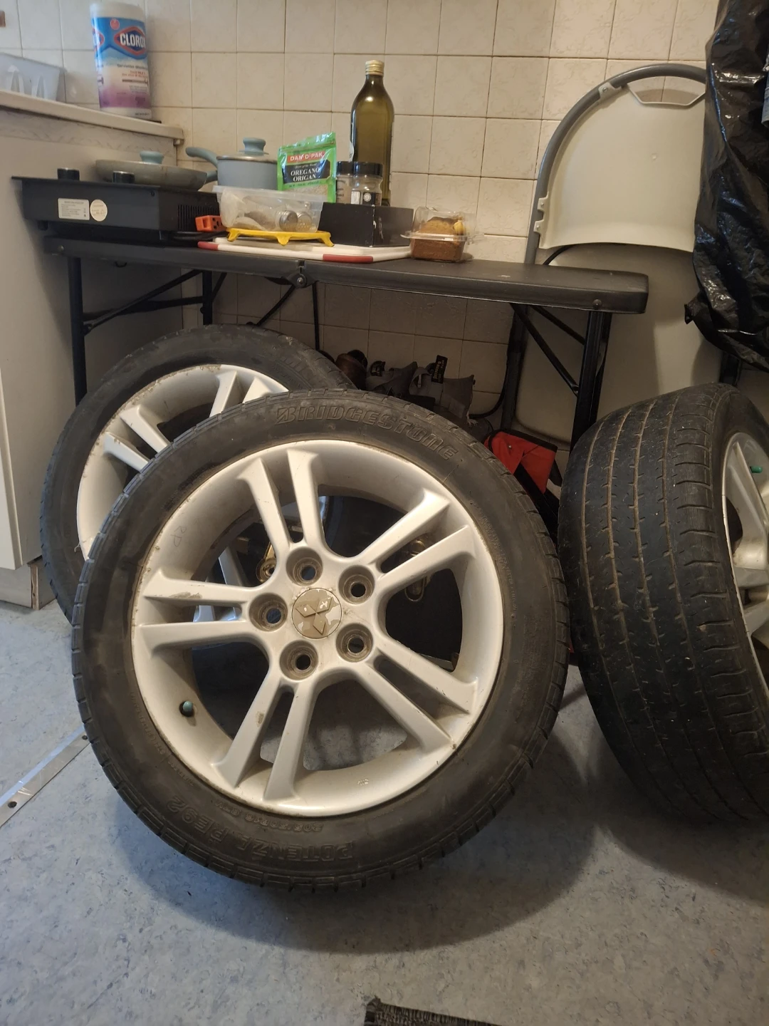 15inch 205 Mitsubishi tires and aluminum rims.