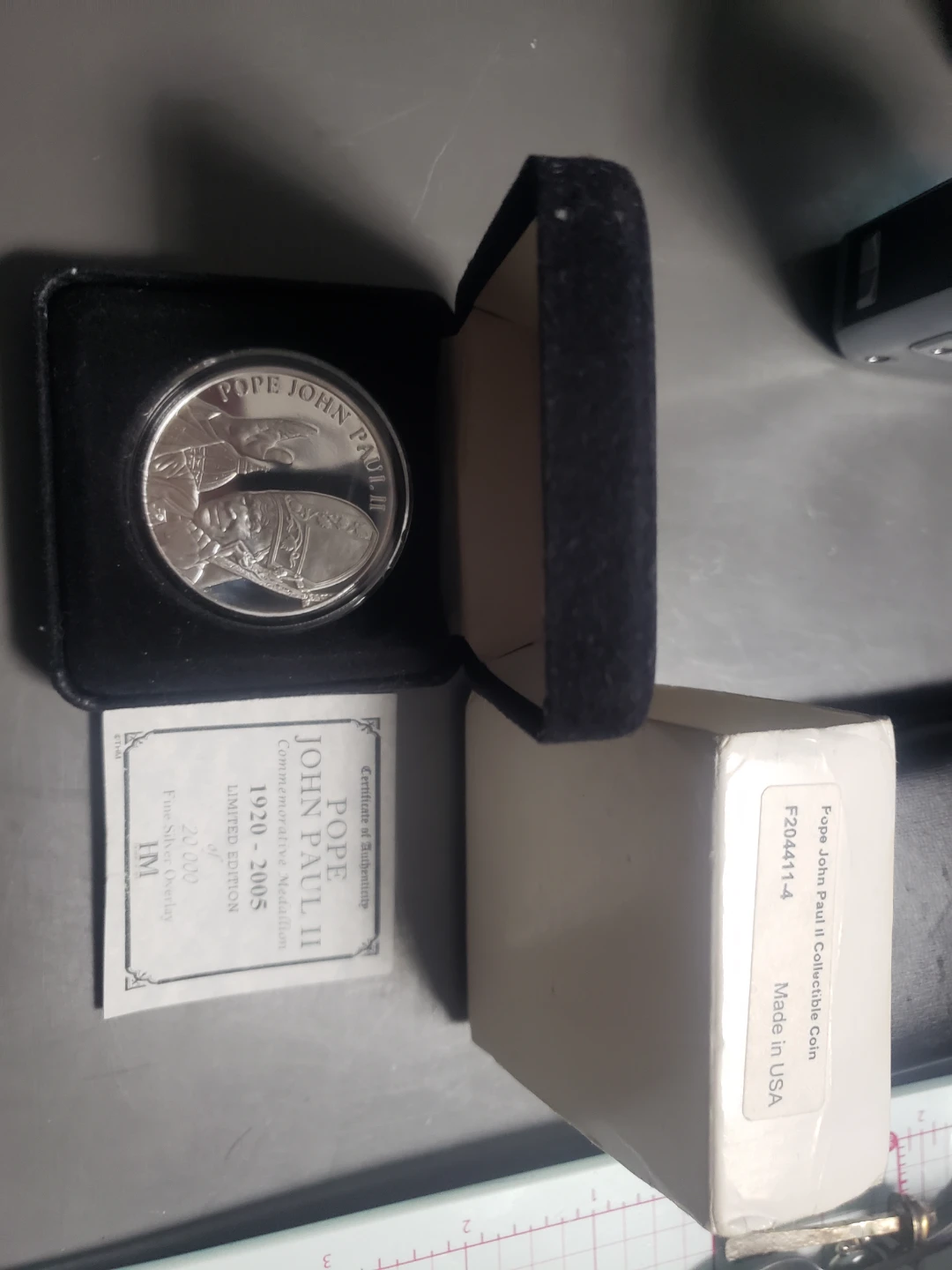 Silver overlay coin with certificate trades.