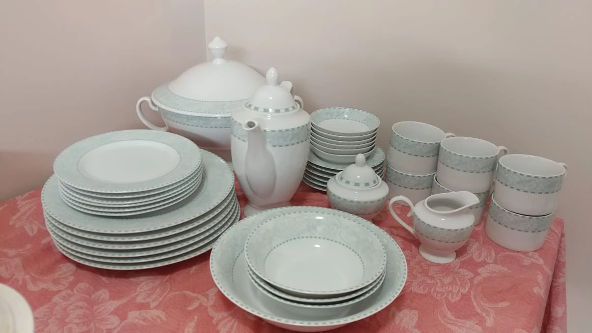 White Ceramic Dinnerware Set with Light Blue Pattern