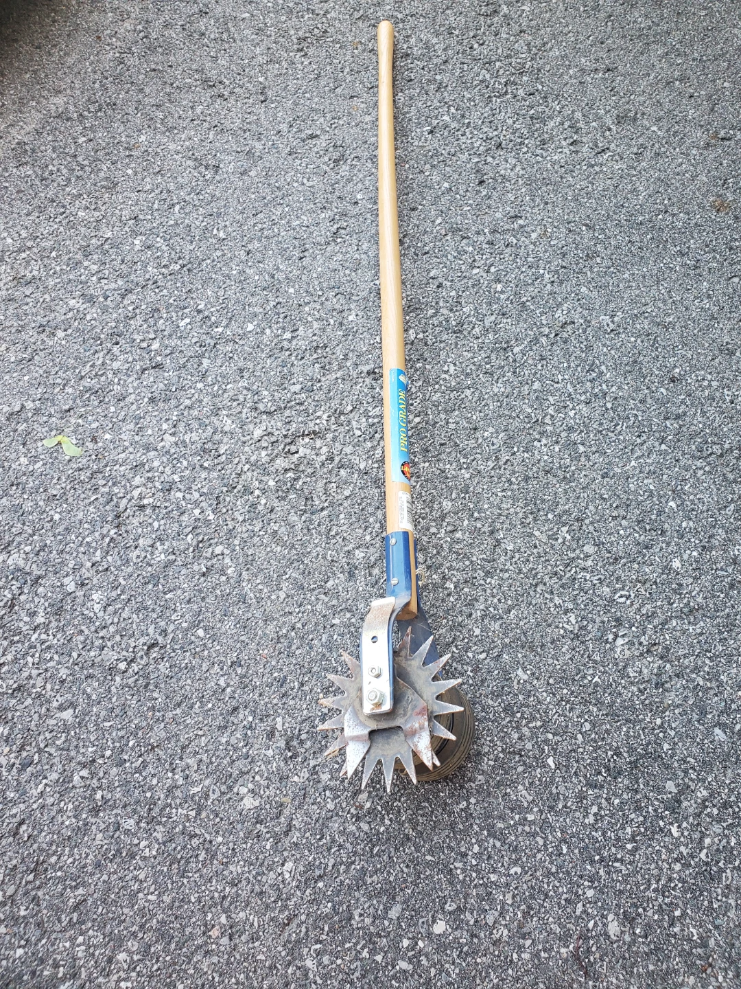 Manual rotary edger tool w/ 48" handle and adjustable tiller