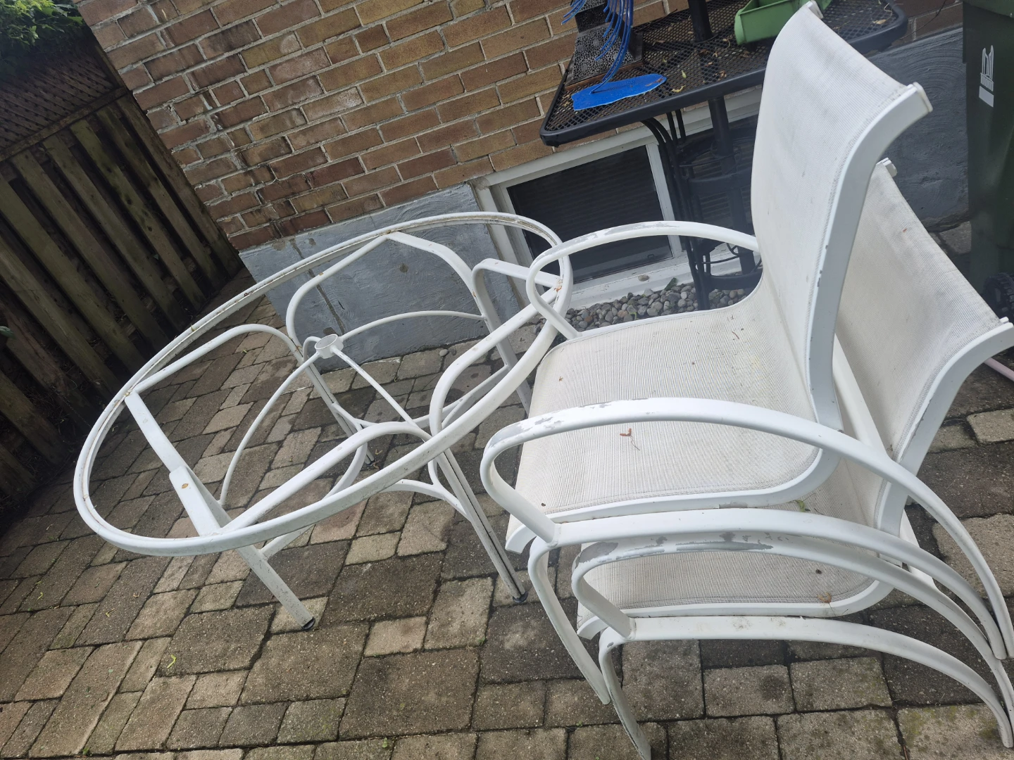 Outdoor round glass table only 2 chairs