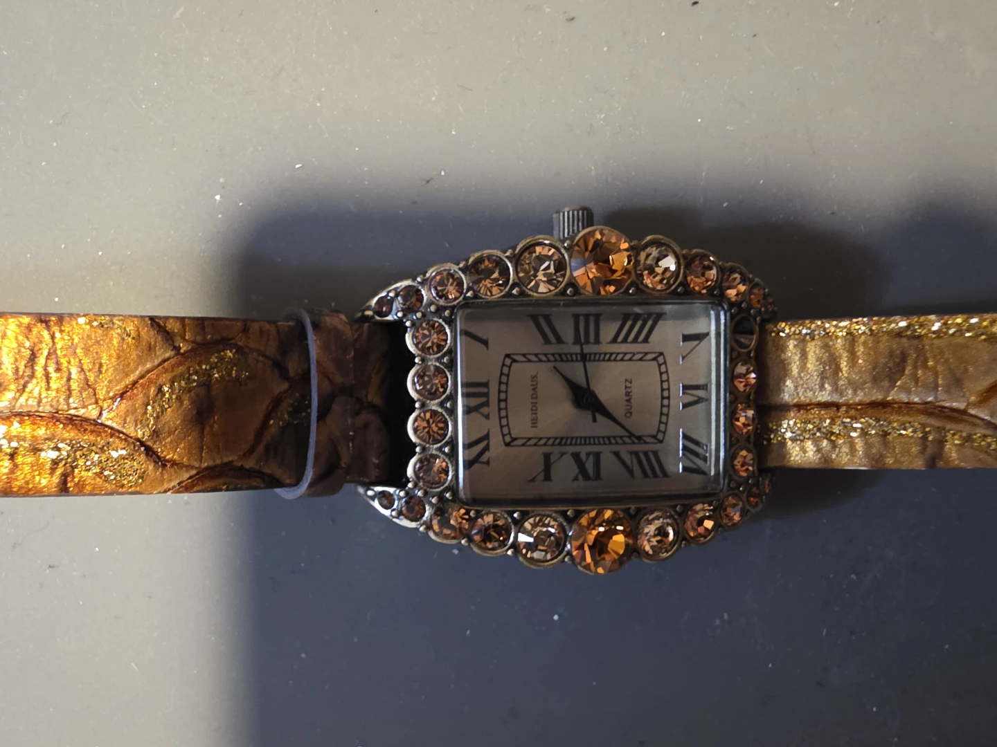 HEIDI DAUS "Shimmering Serpent" Crystal and Leather Band Watch
