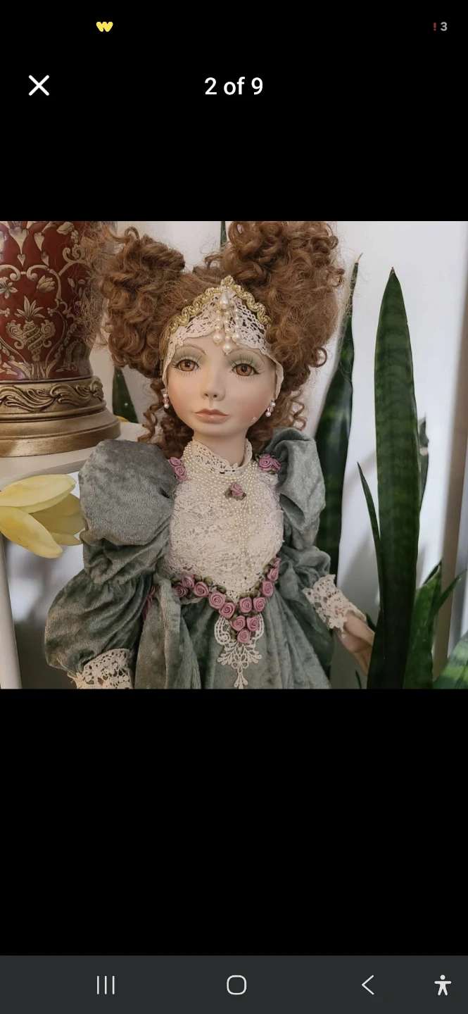 Vintage Porcelain Doll with Elaborate Dress