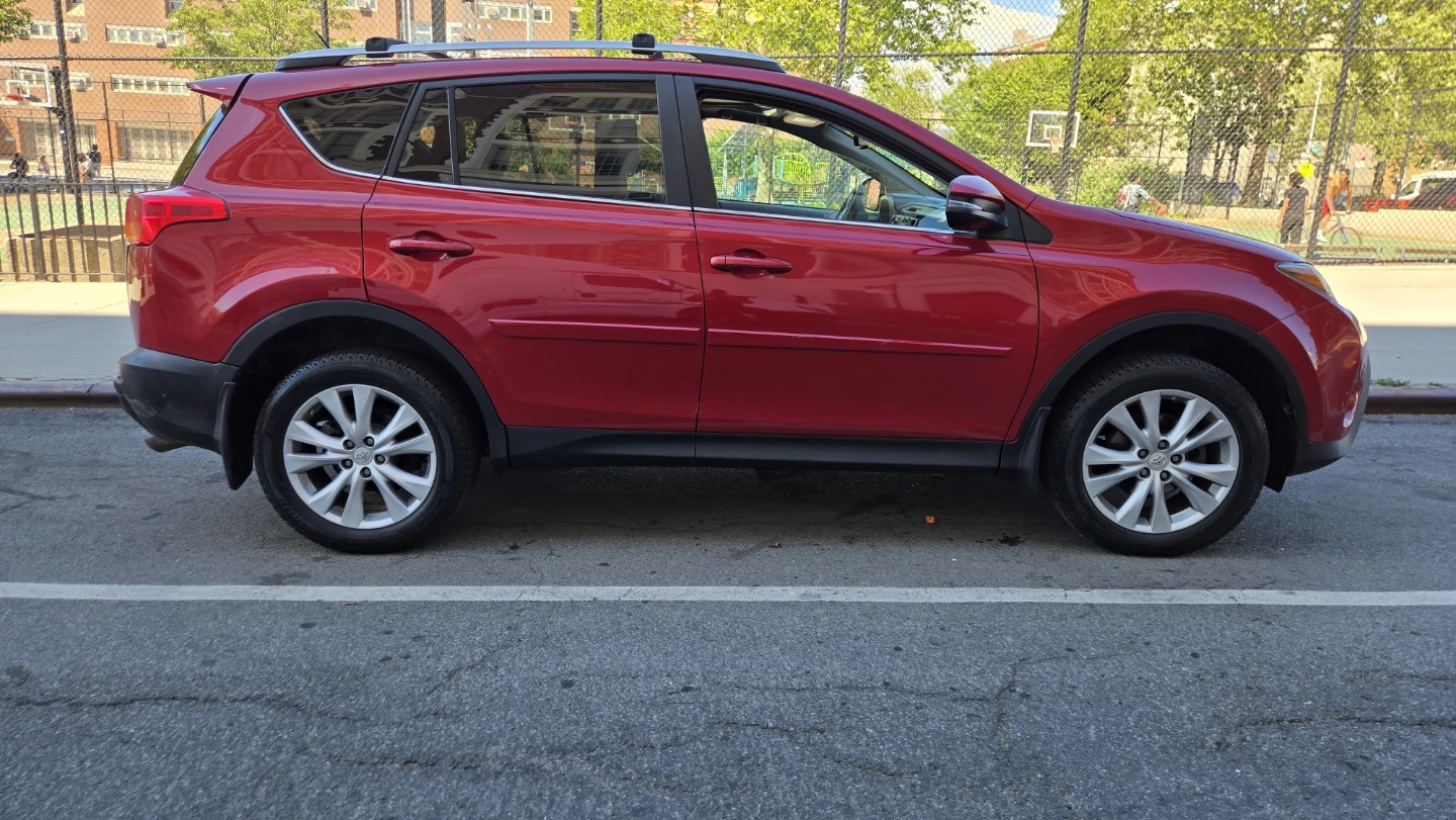 2013 Red Toyota RAV4 Limited AWD - photo 2