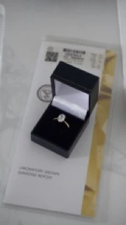 2.15 ct lab grown diamond with a 14k gold band