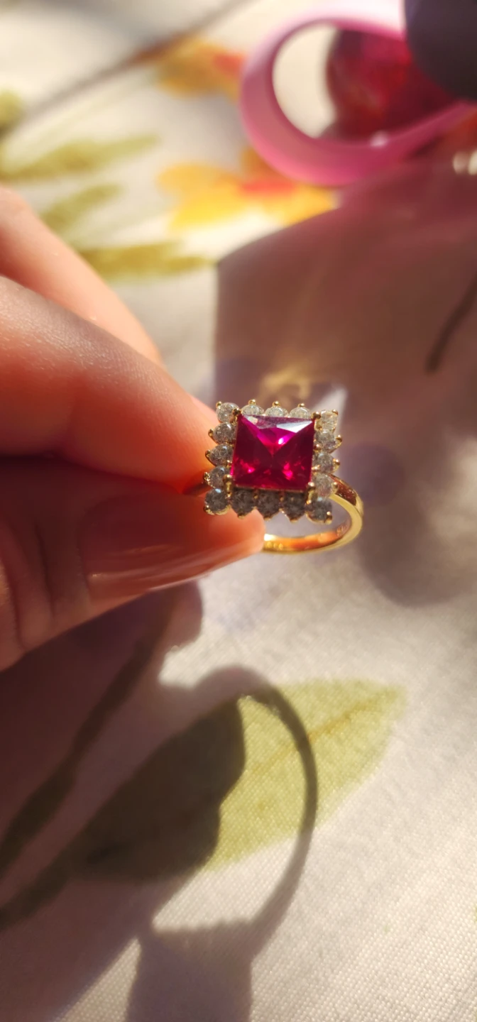 Gold platted Ring with Red Stone and Crystals