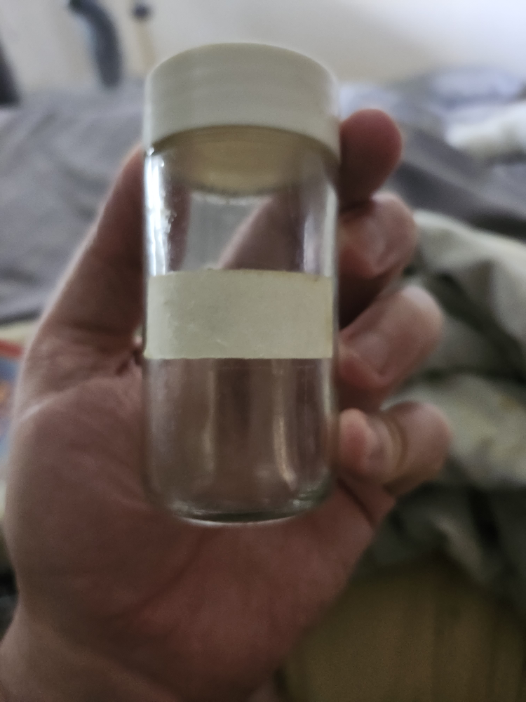 Small glass jar with white lid