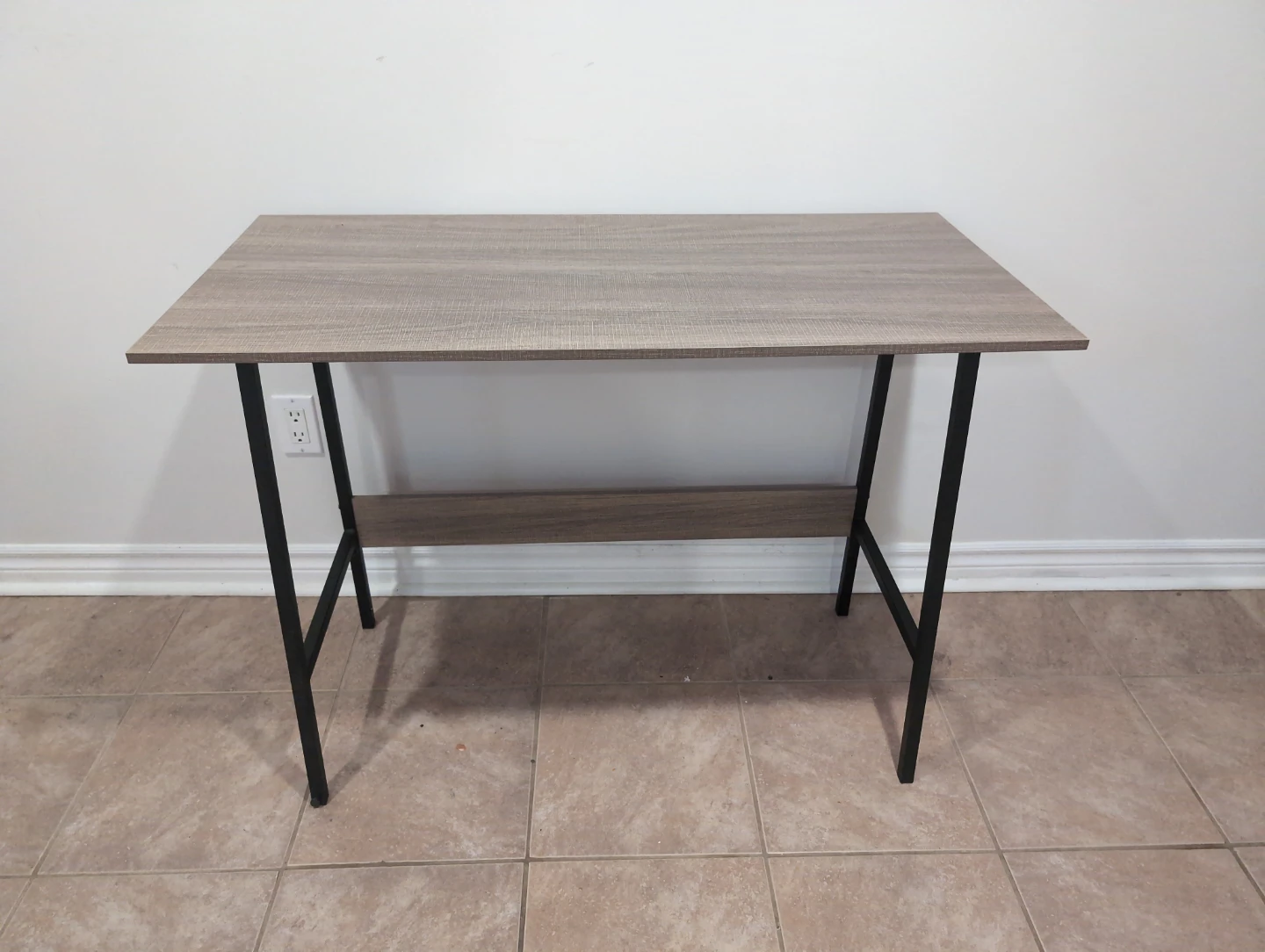 Wood grain desk with metal legs