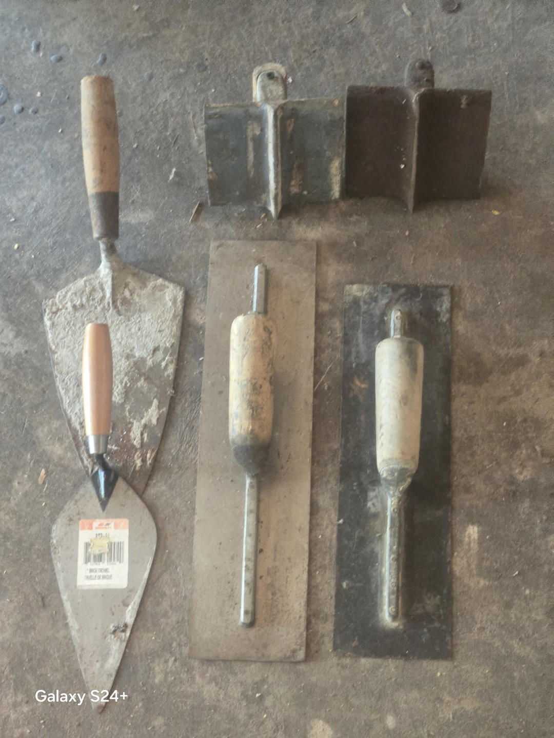 Assorted Trowels and Masonry Tools