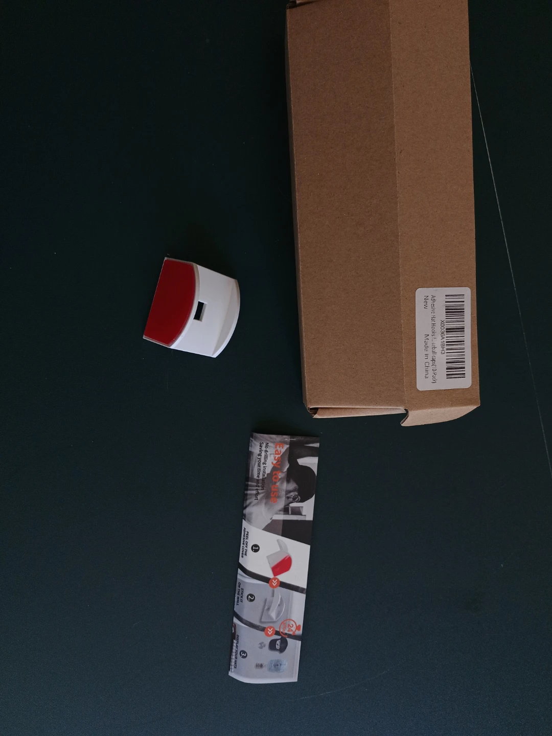Adhesive hat hooks